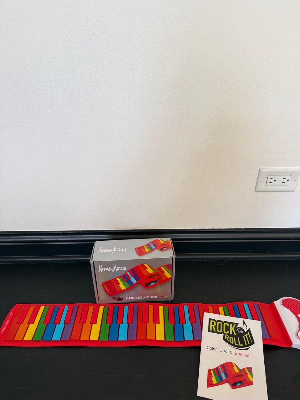 Neiman Marcus Red Roll-Up Piano with Rainbow Keys